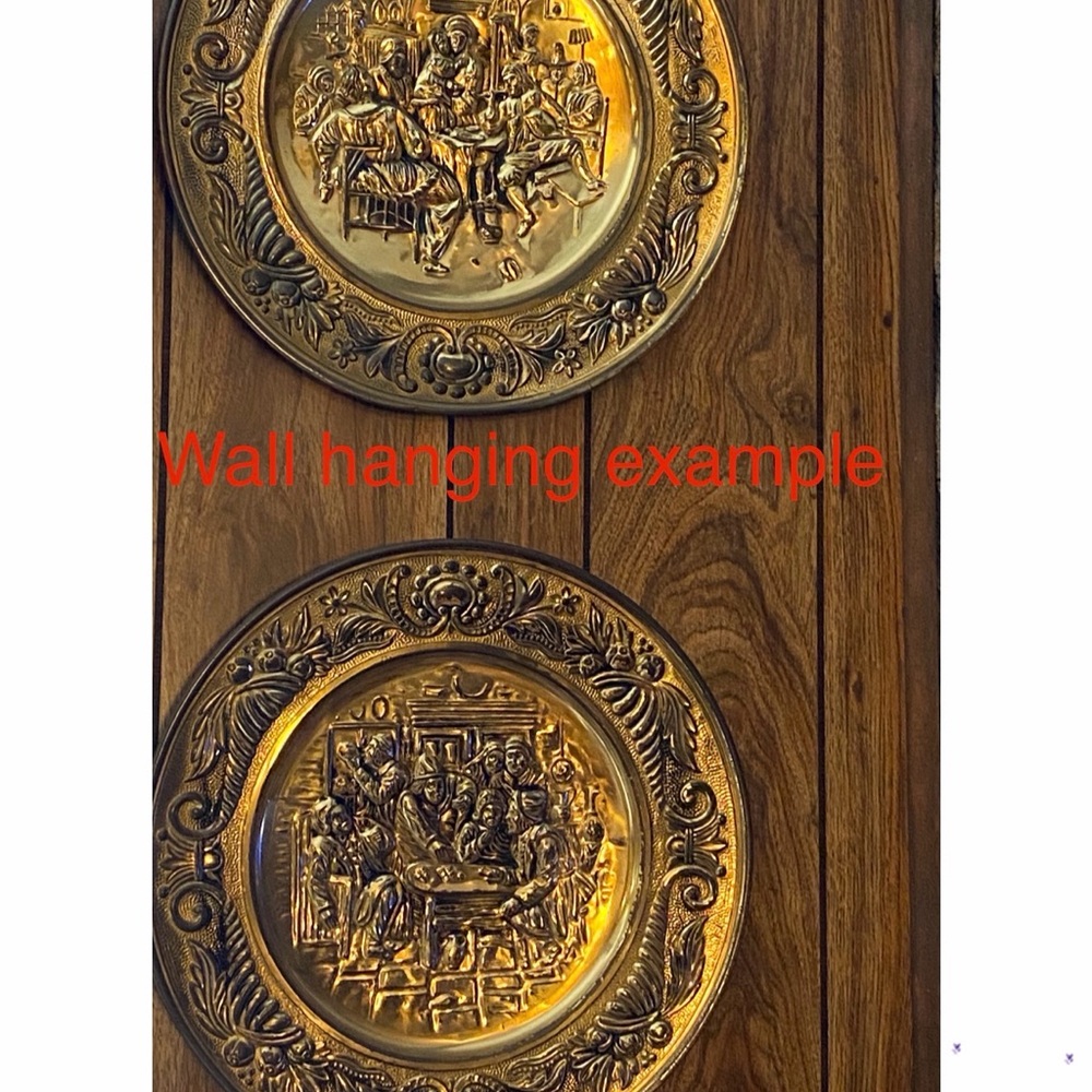 set of vintage 3 embossed brass wall-hanging plates.